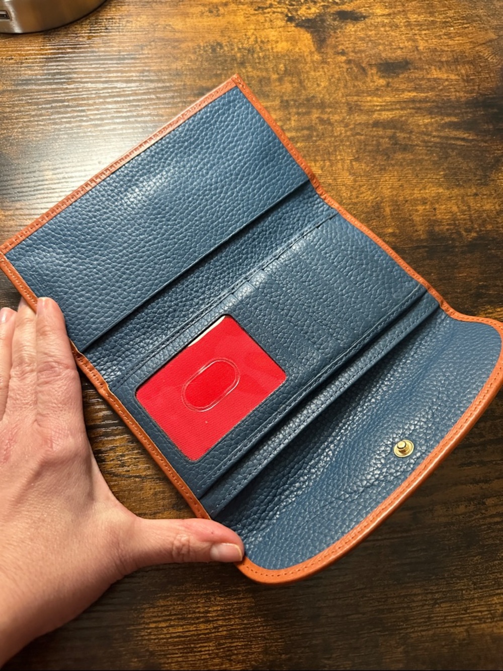 Dooney & Bourke Navy Pebbled Leather Continental Wallet with Brown Trim - Picture 2 of 3